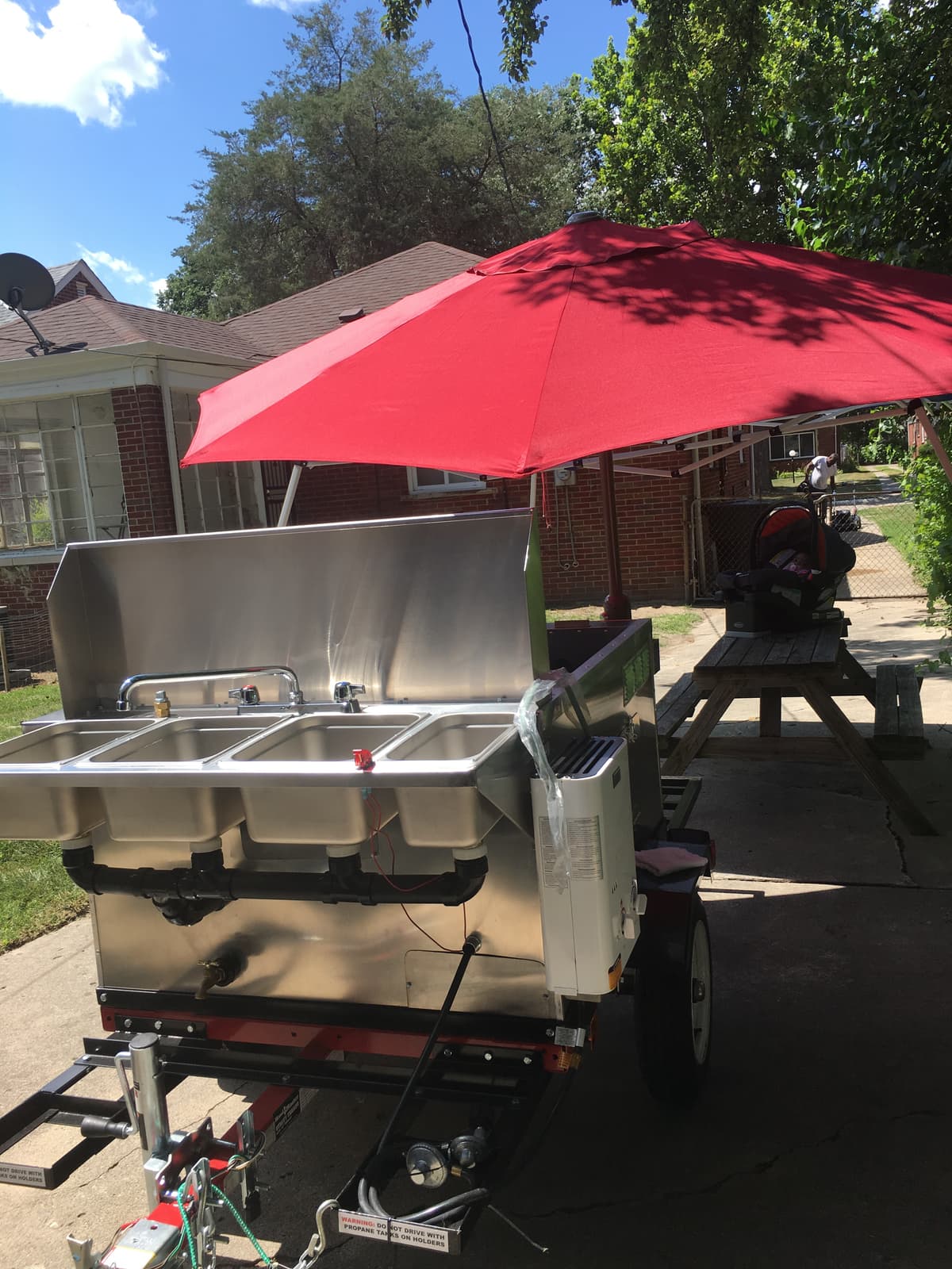 KYC Doggz cart setup with the red umbrella