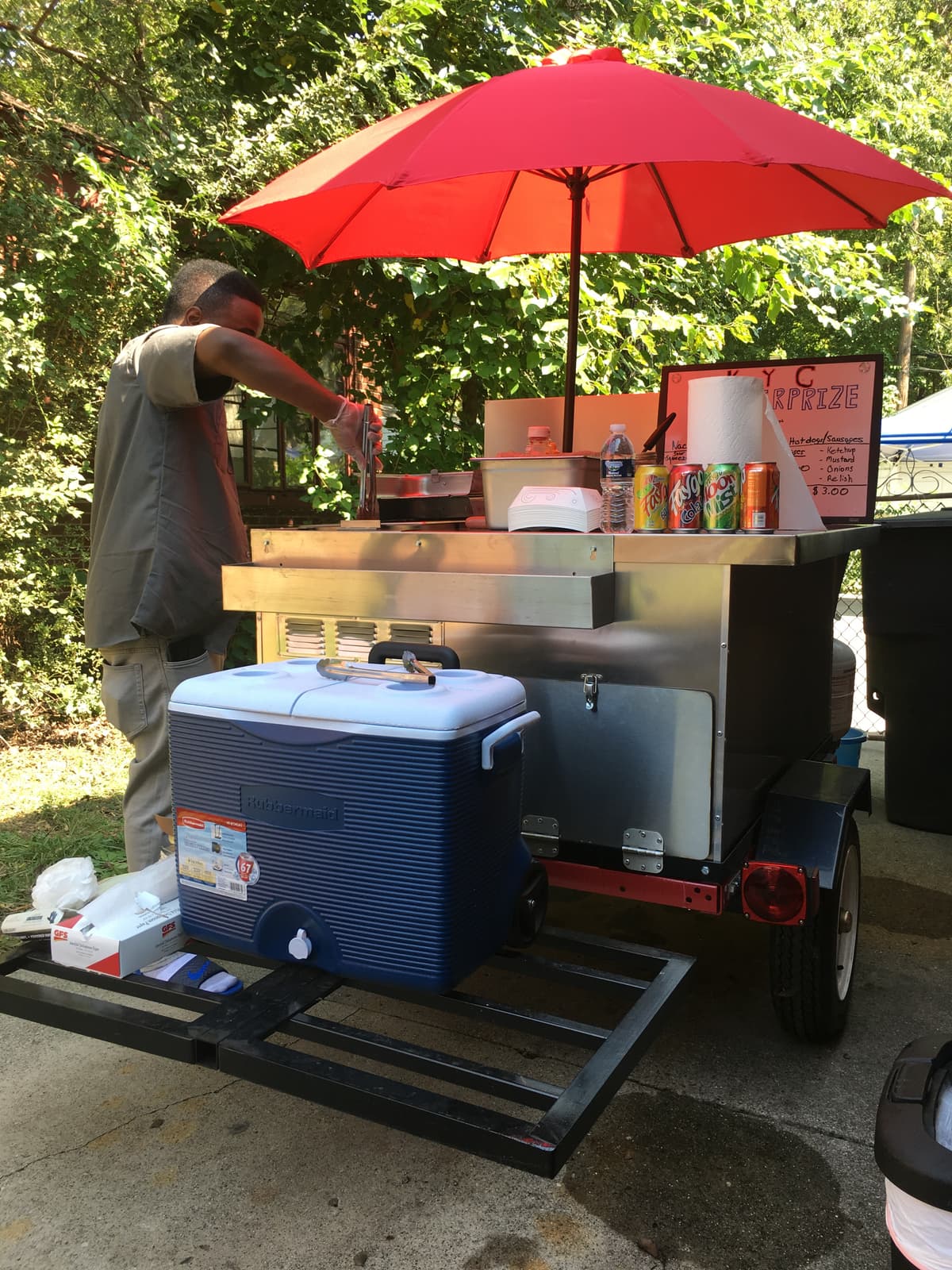 Full KYC Doggz cart setup with signage and cooler